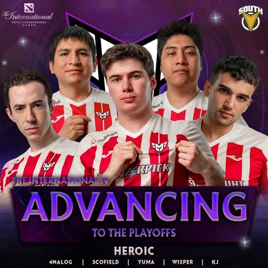 Heroic Dota 2 team photo celebrating advancement to the playoffs at The International 2025, with players wearing red and white jerseys.