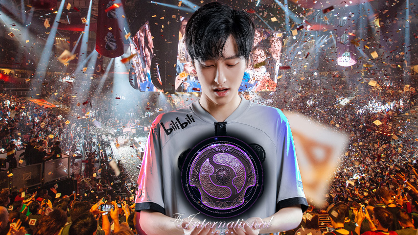 Ame from Xtreme Gaming holding the Aegis of Champions on stage at The International, with confetti and cheering crowd in the background.