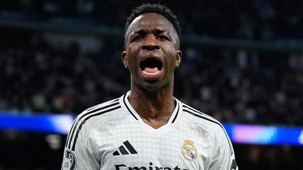 Vinicius Junior celebrating passionately for Real Madrid during a UEFA Champions League match