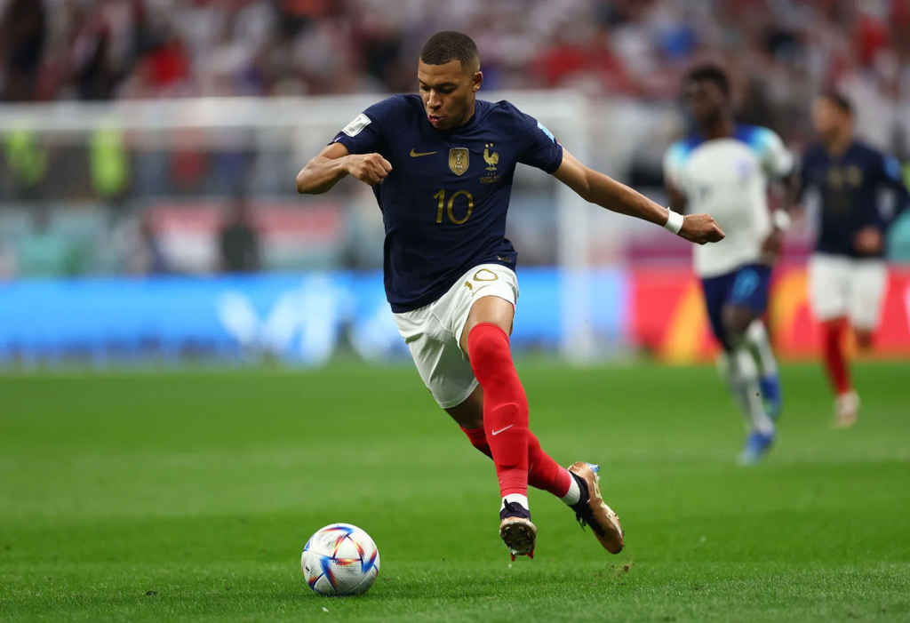Kylian Mbappe in action for France during an international football match