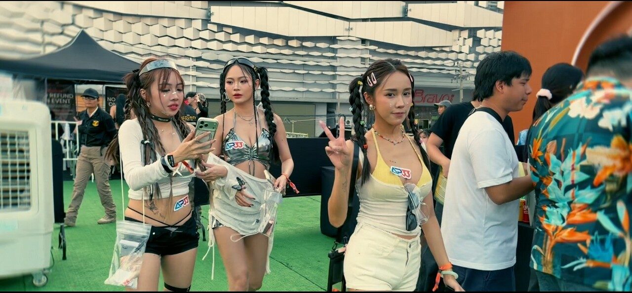 Alt Text: AP33 Songkran Festival 2026 outdoor event featuring influencers and attendees enjoying a Thai New Year water festival celebration.