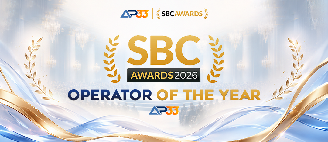 AP33 Operator of the Year shortlist banner for the SBC Awards 2026, featuring gold laurels and flowing blue-and-gold ribbons.